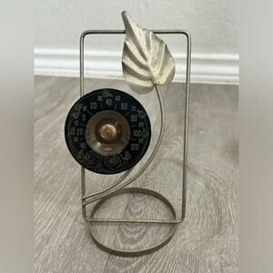 Vintage Cooper- thermometer- rusted patina- some wear and bent bottom- leaf rose